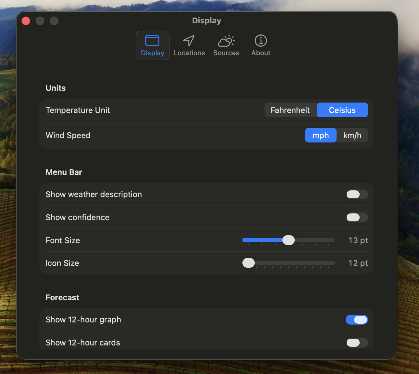 Weather Meter Settings — Display tab showing temperature and wind-speed units, menu bar options for weather description and confidence, font and icon size, and toggles for the 12-hour graph and cards.